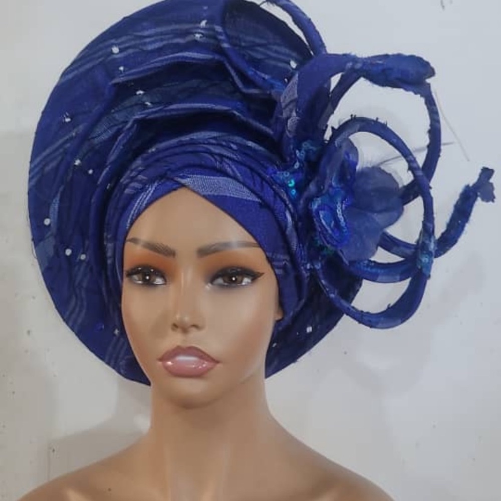Elegant Blue Headwrap with Floral Design
REASONABLE OFFERS ACCEPTED

GEL8 0326